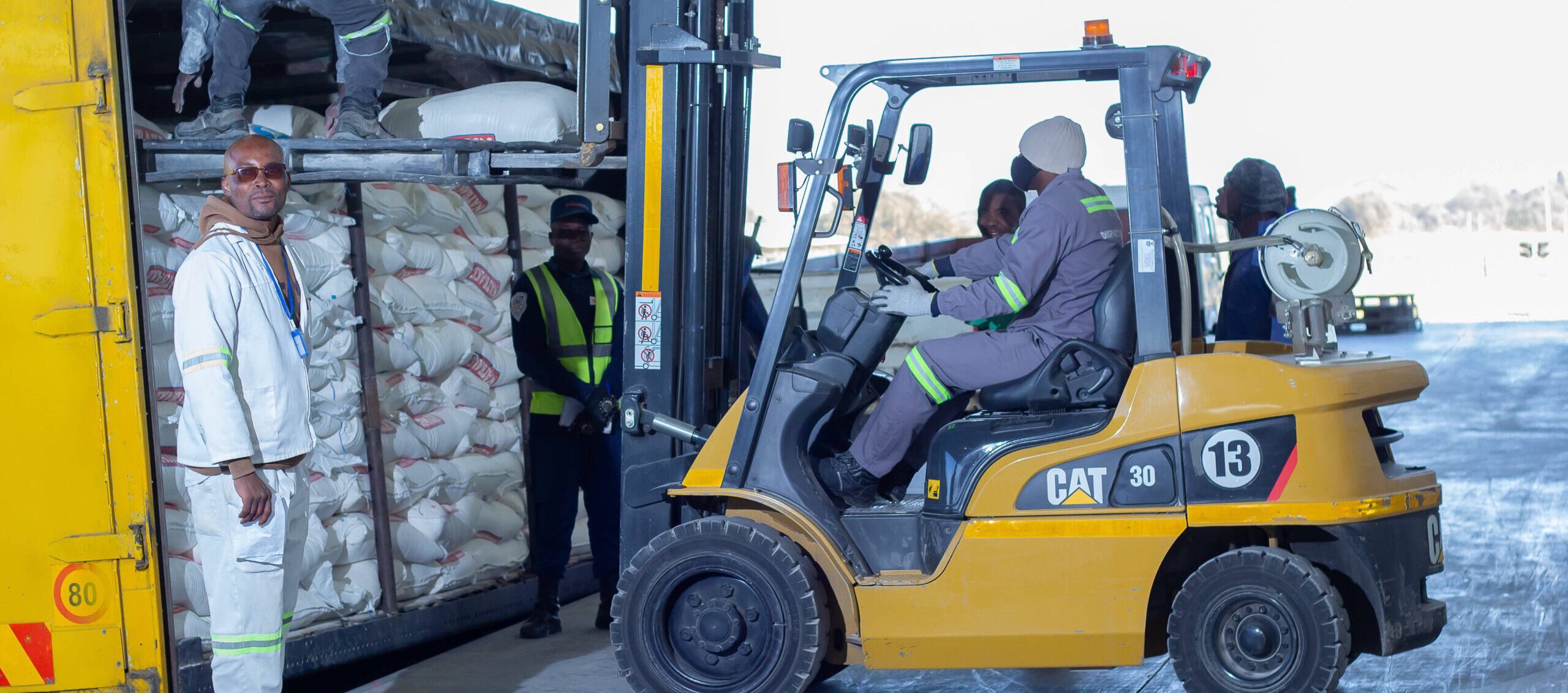 NMC team loading stockfeed for distribution